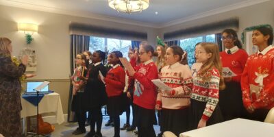 Students sing at local residential care homes
